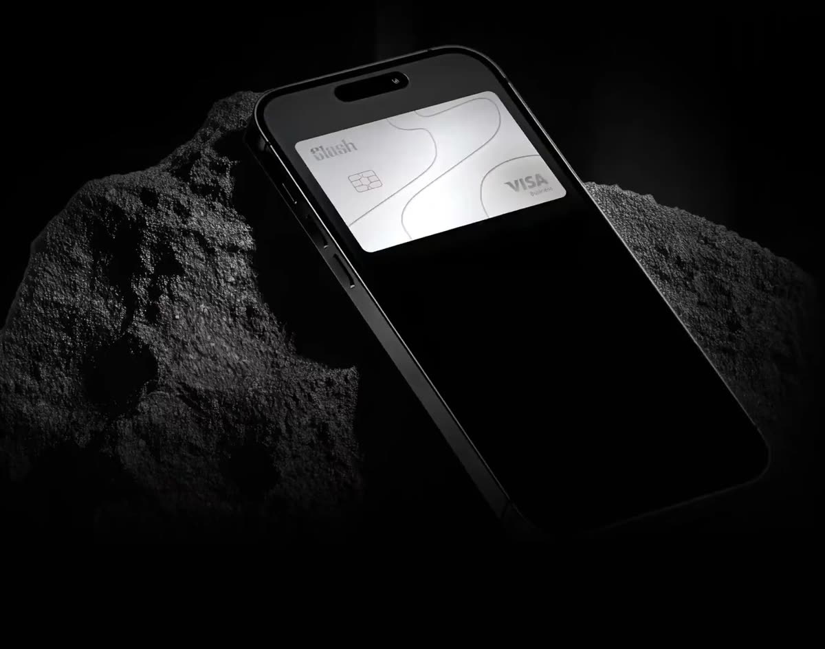 Slash Visa Business card on a phone against volcanic rock
